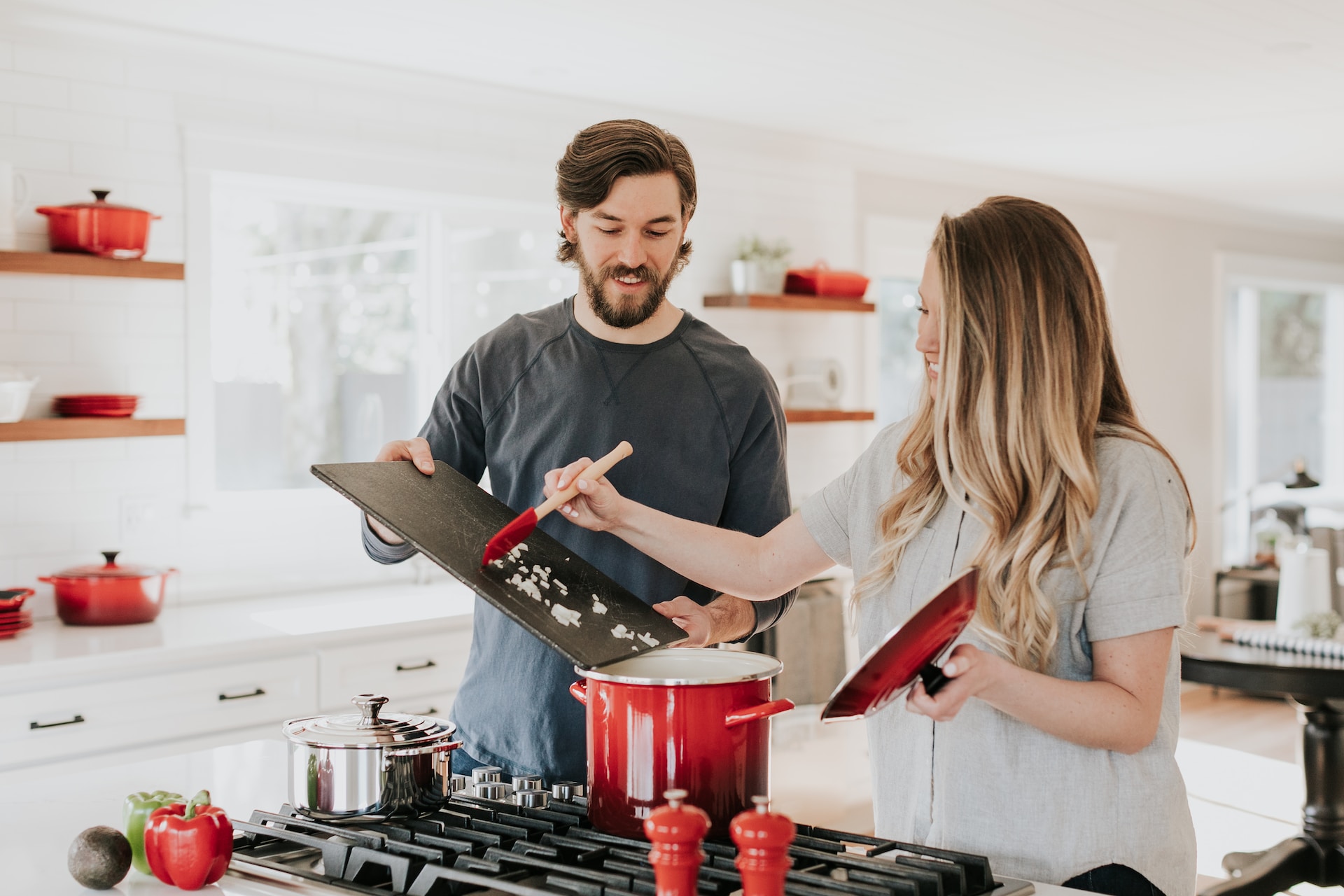 A couple making dinner together