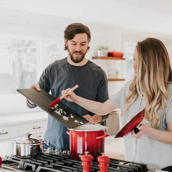 A couple making dinner together